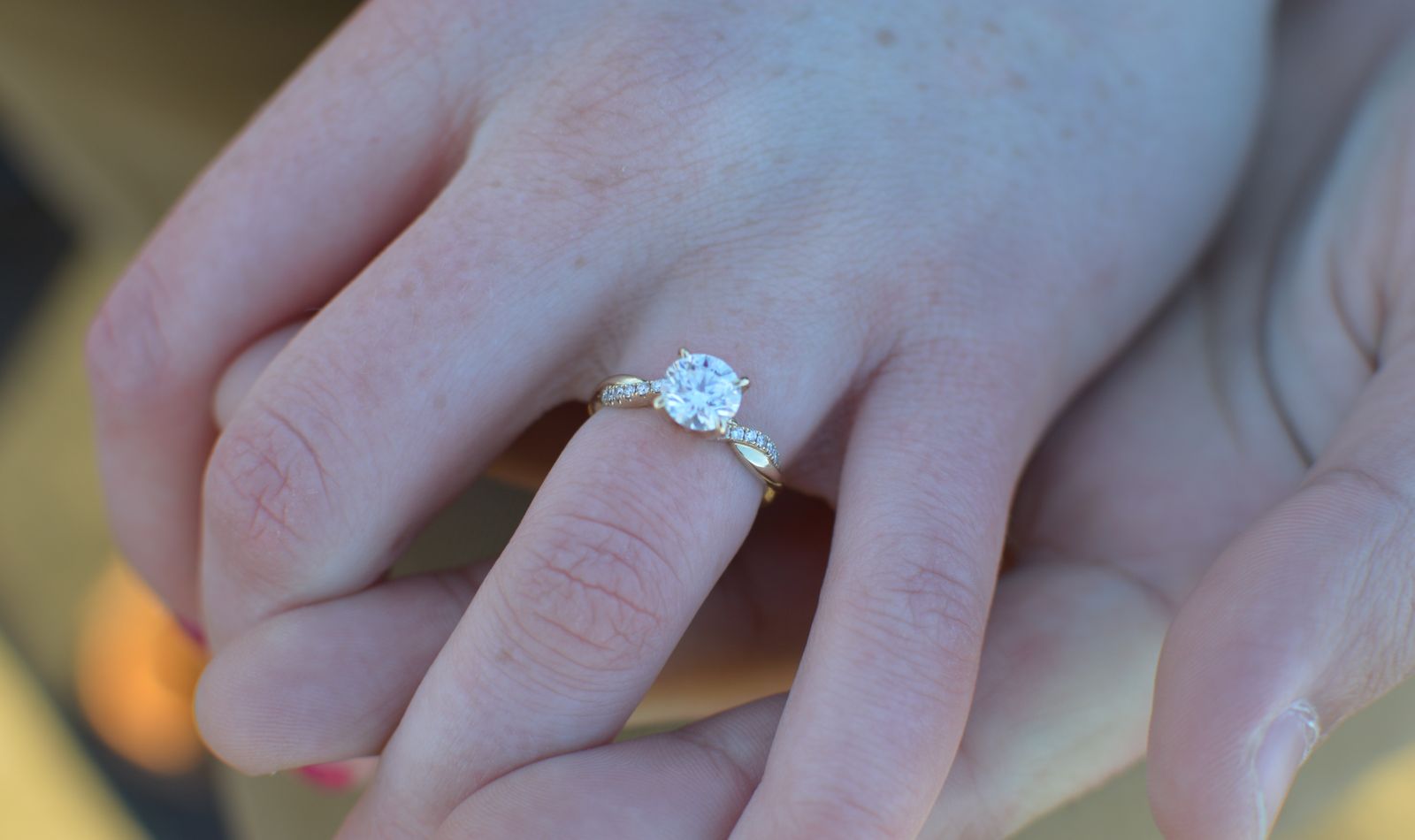 Close-up of a hand-set diamond engagement ring, handcrafted by Aurelia in Auckland